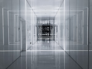 white tiled hallway with white tiled walls