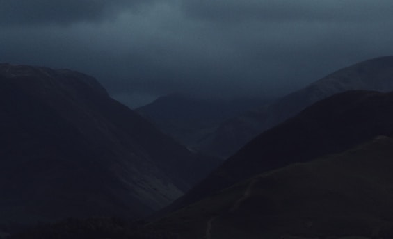 A dark, moody landscape of Siwan district, highlighting its neglected state.