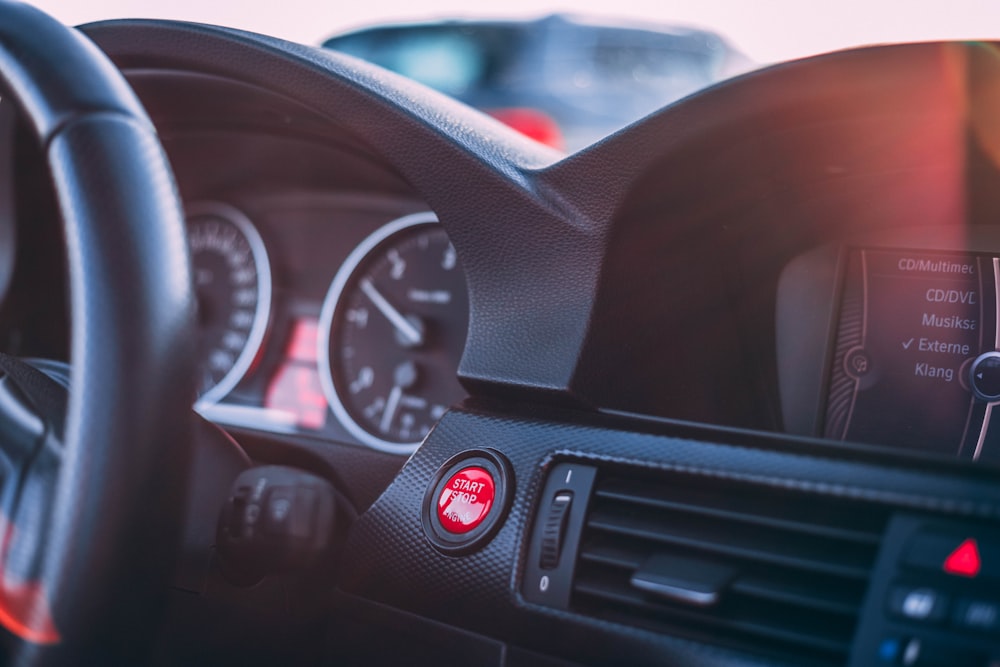 black and gray car steering wheel