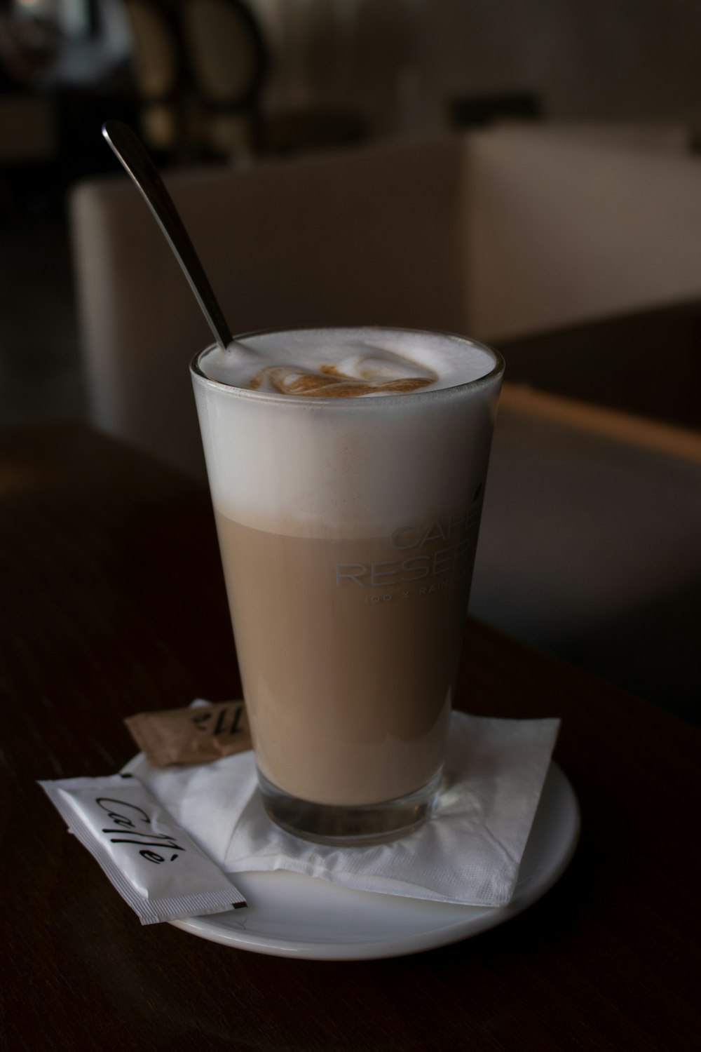 clear drinking glass with brown liquid