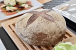 bread on brown wooden tray