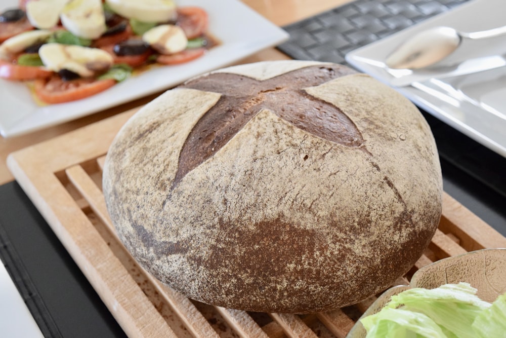 bread on brown wooden tray