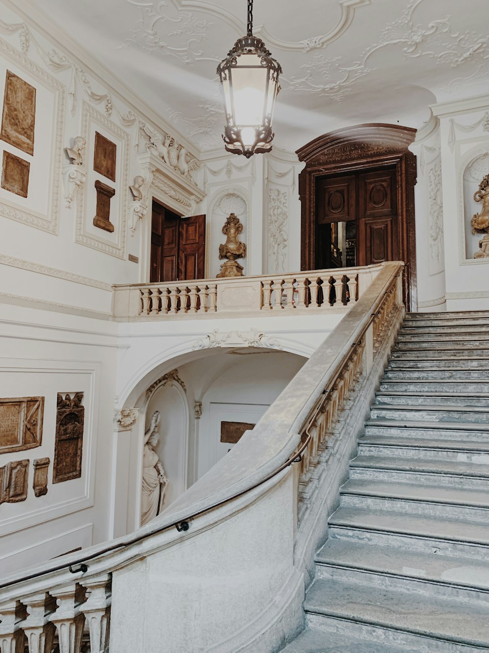 white and brown wooden staircase