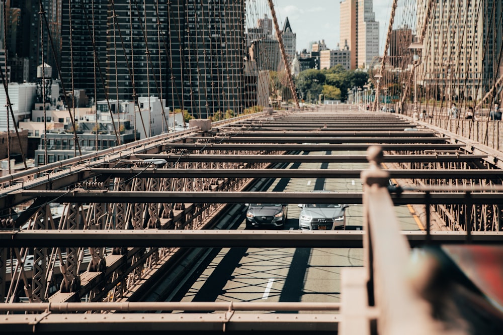 people walking on train rail during daytime