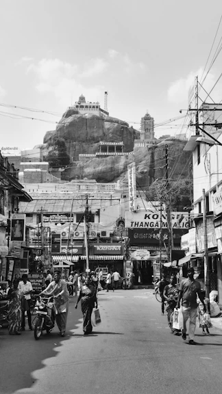 grayscale photo of people walking on street