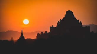 silhouette of mountain during sunset