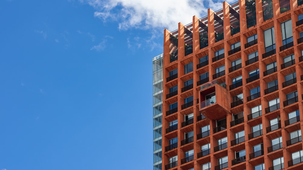 brown concrete building under blue sky during daytime