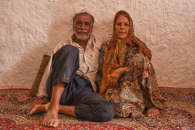 Couple seated in traditional attire