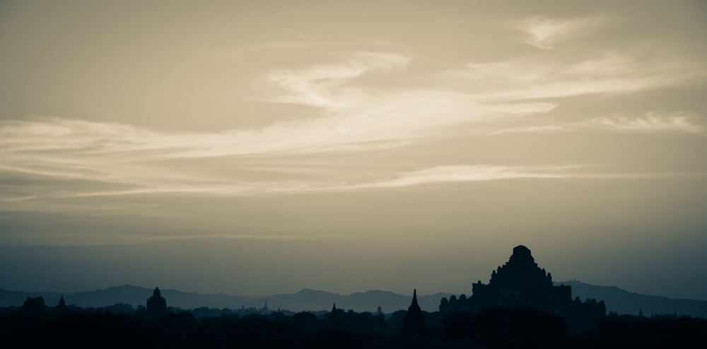 silhouette of mountain during sunset