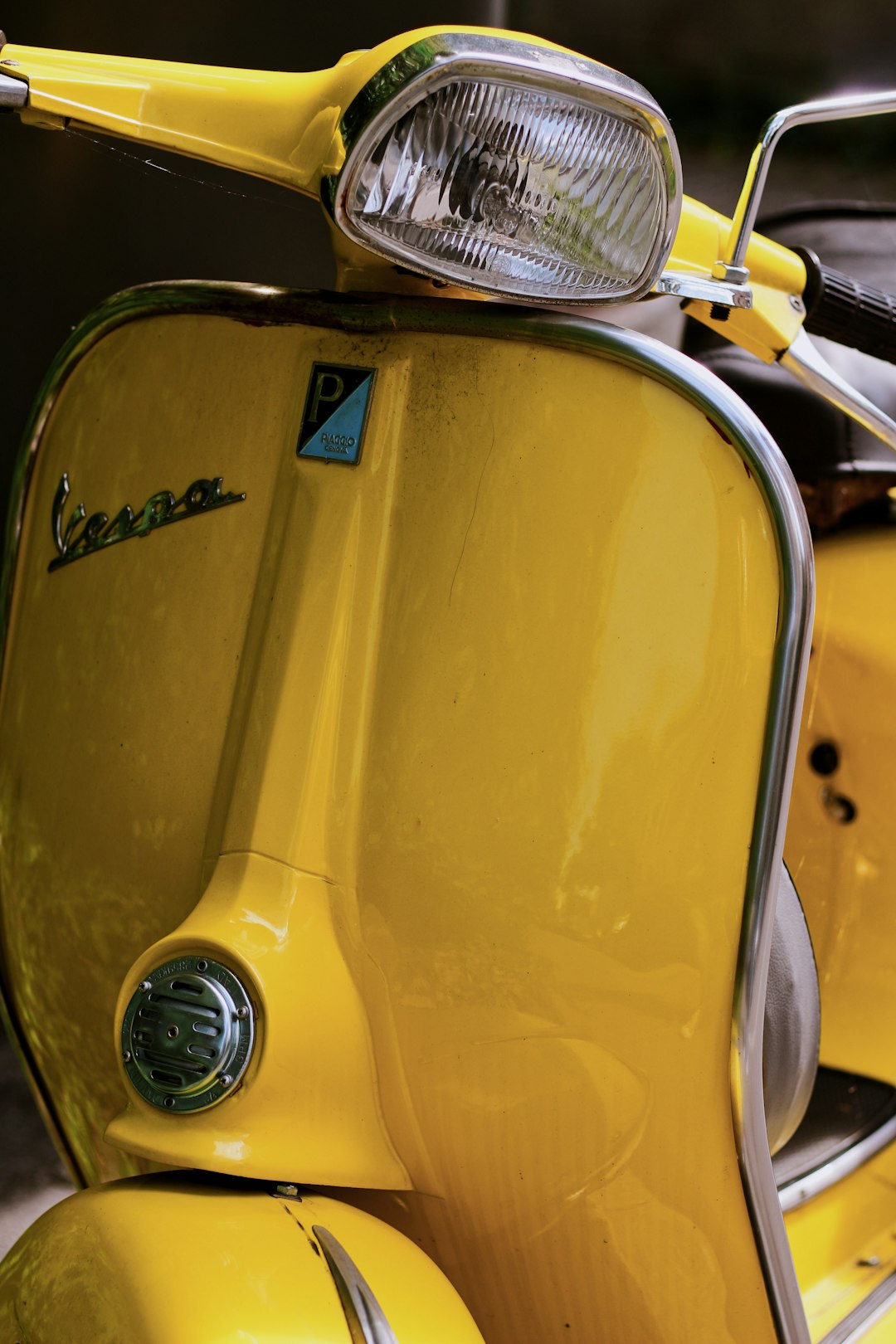 yellow and white scooter motorcycle