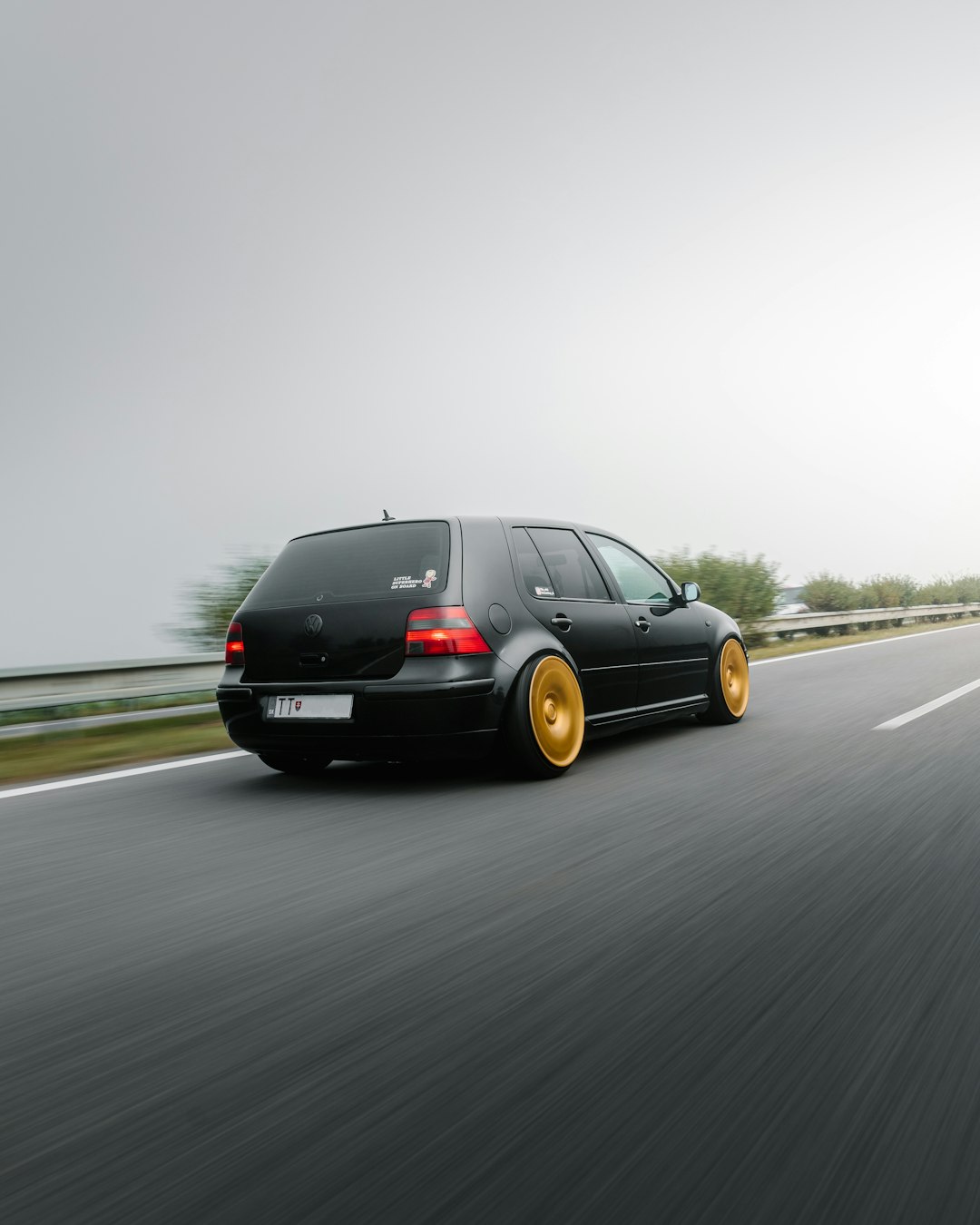 black bmw m 3 on road