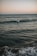 person surfing on sea during daytime