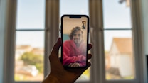 person holding black iphone 5