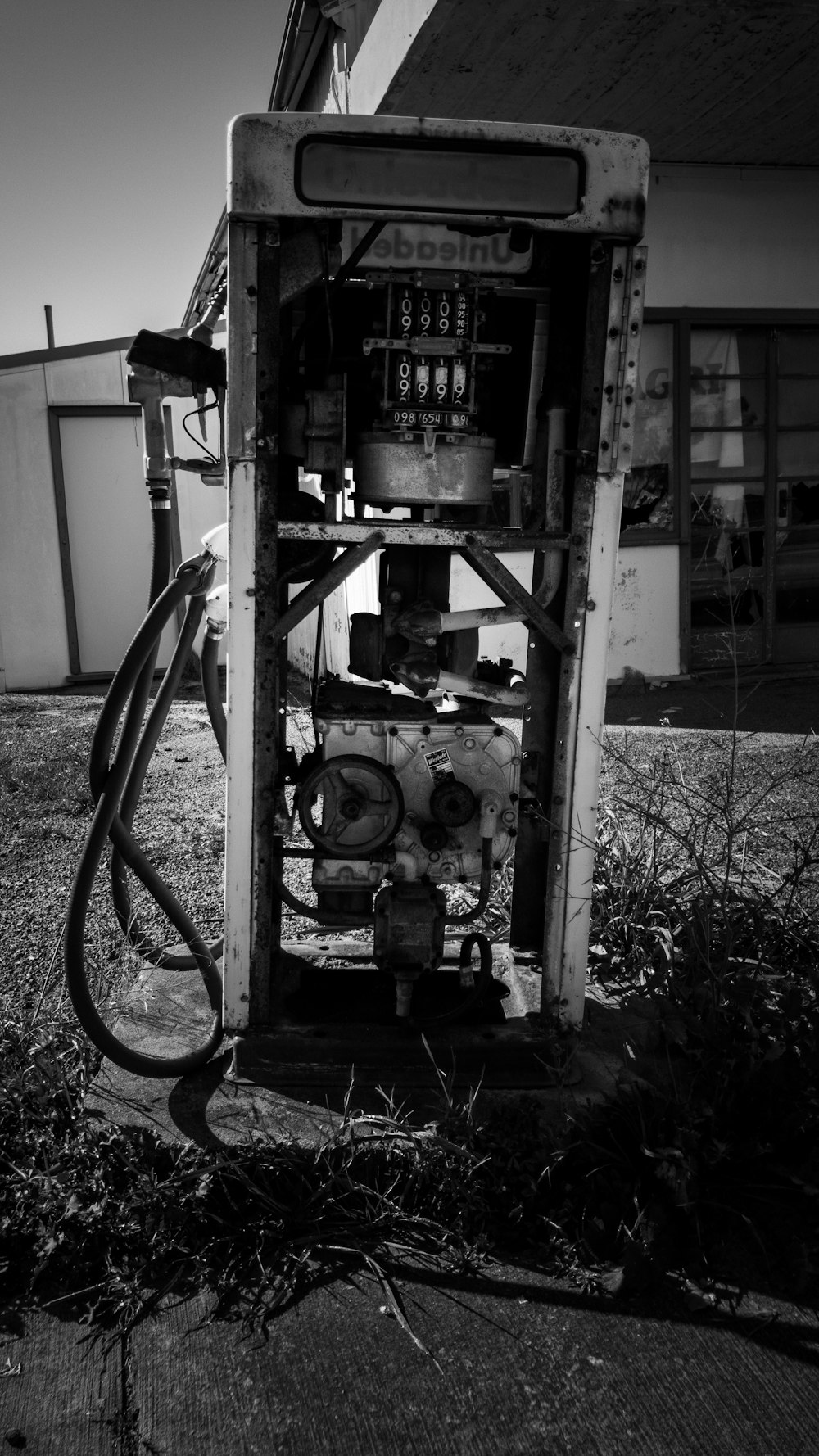 grayscale photo of metal machine