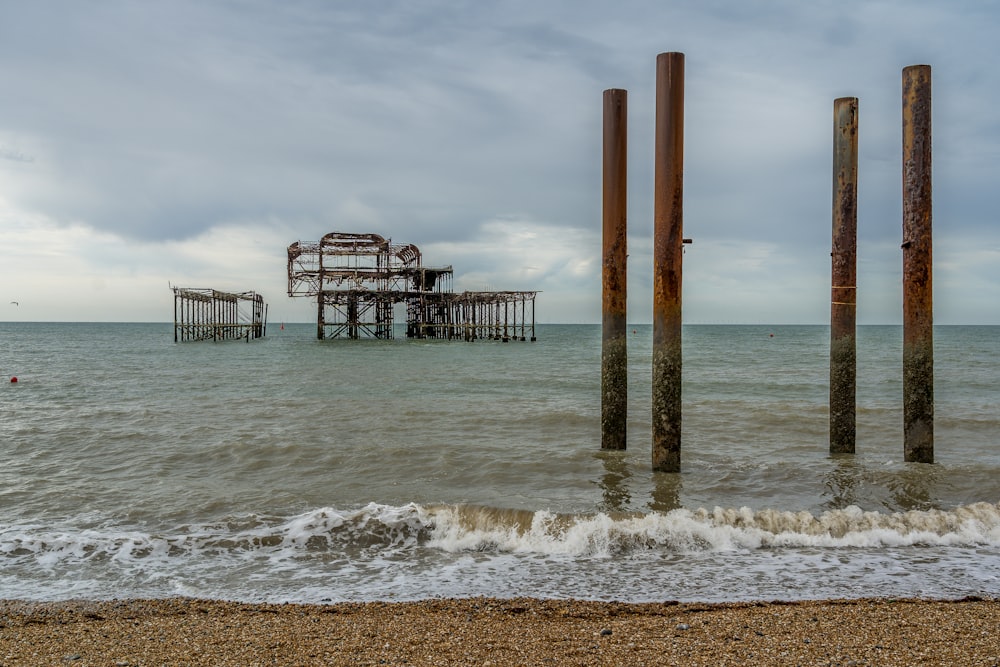 brown wooden dock on sea during daytime