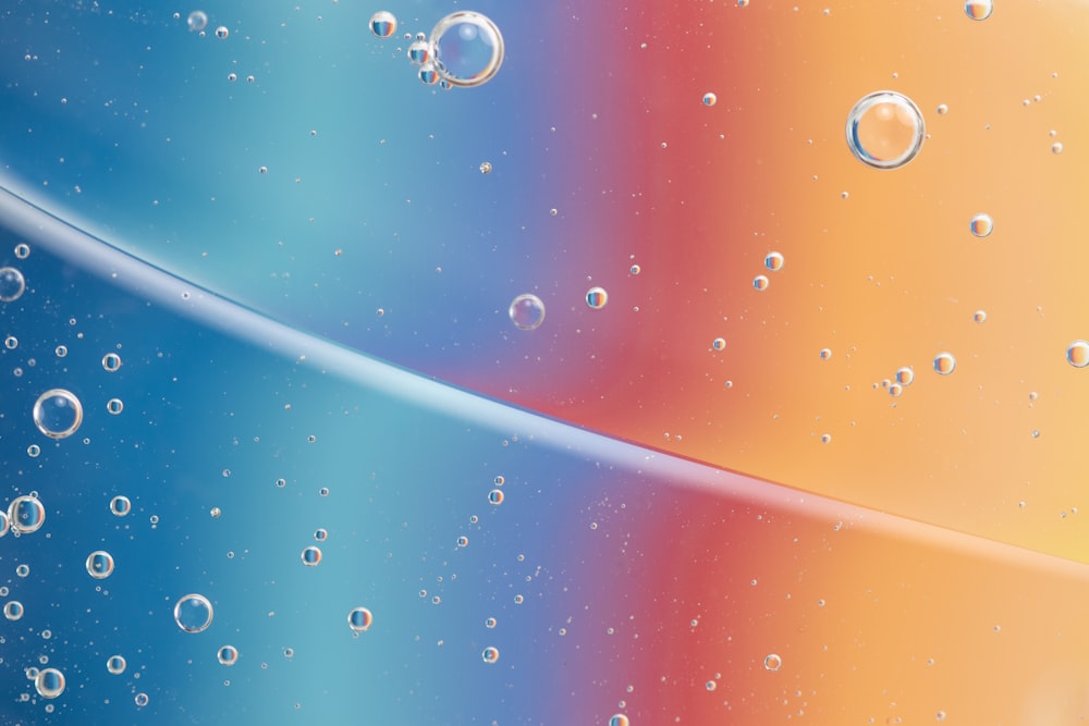 water droplets on blue plastic bucket