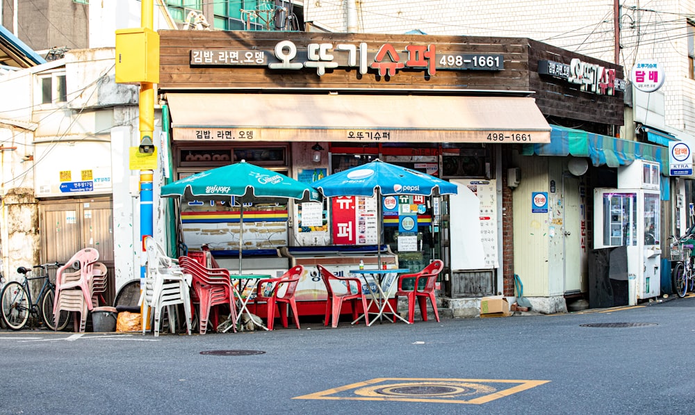 red and white wooden restaurant with red and white chairs and tables