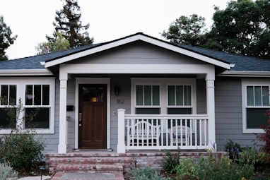 white and brown wooden house