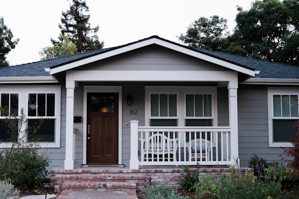 white and brown wooden house