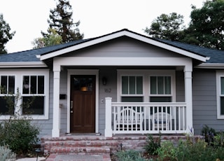 white and brown wooden house