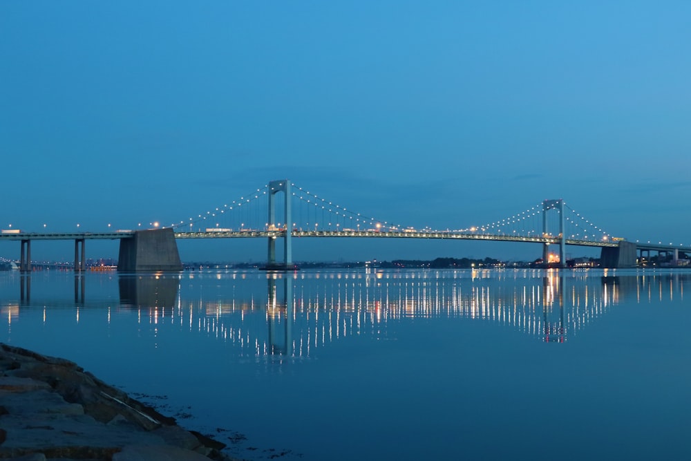 bridge over water during night time