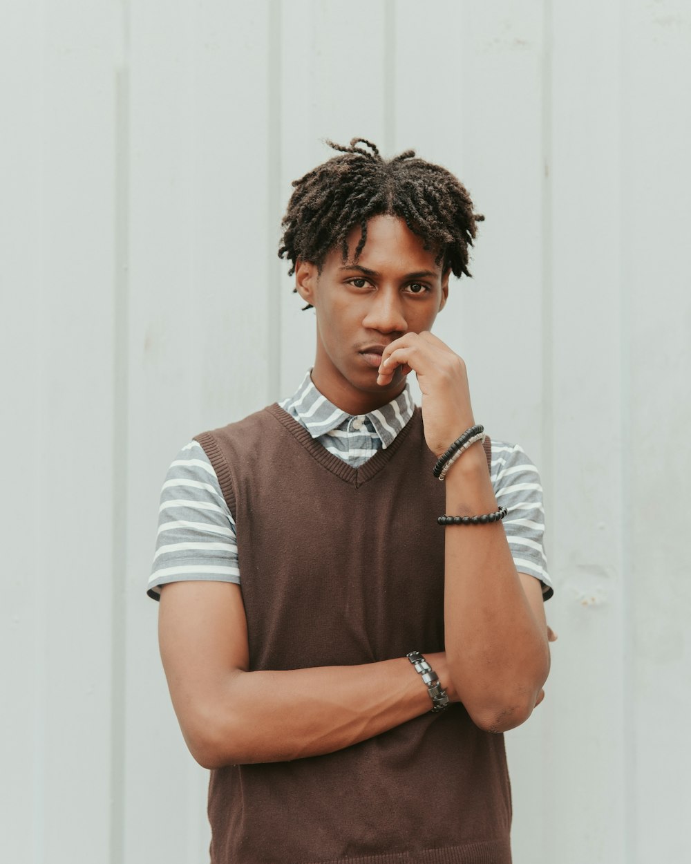 man in blue and white stripe polo shirt