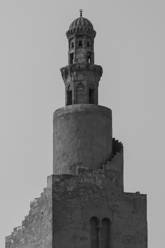 gray concrete tower under white sky in Mosque of Ibn Tulun Egypt