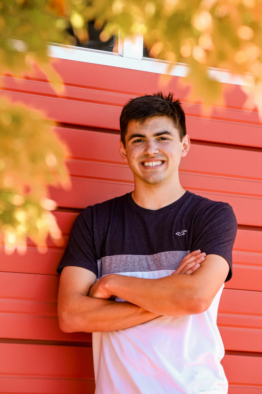 man in black crew neck t-shirt smiling