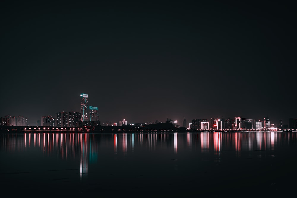 city skyline during night time