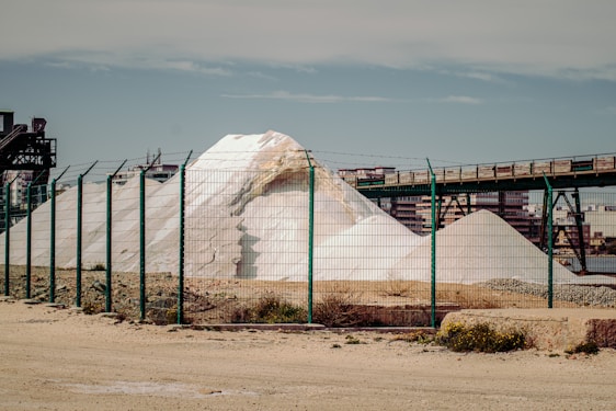 Photo of a Belfoss warehouse with stacked mineral and chemical products ready for export.