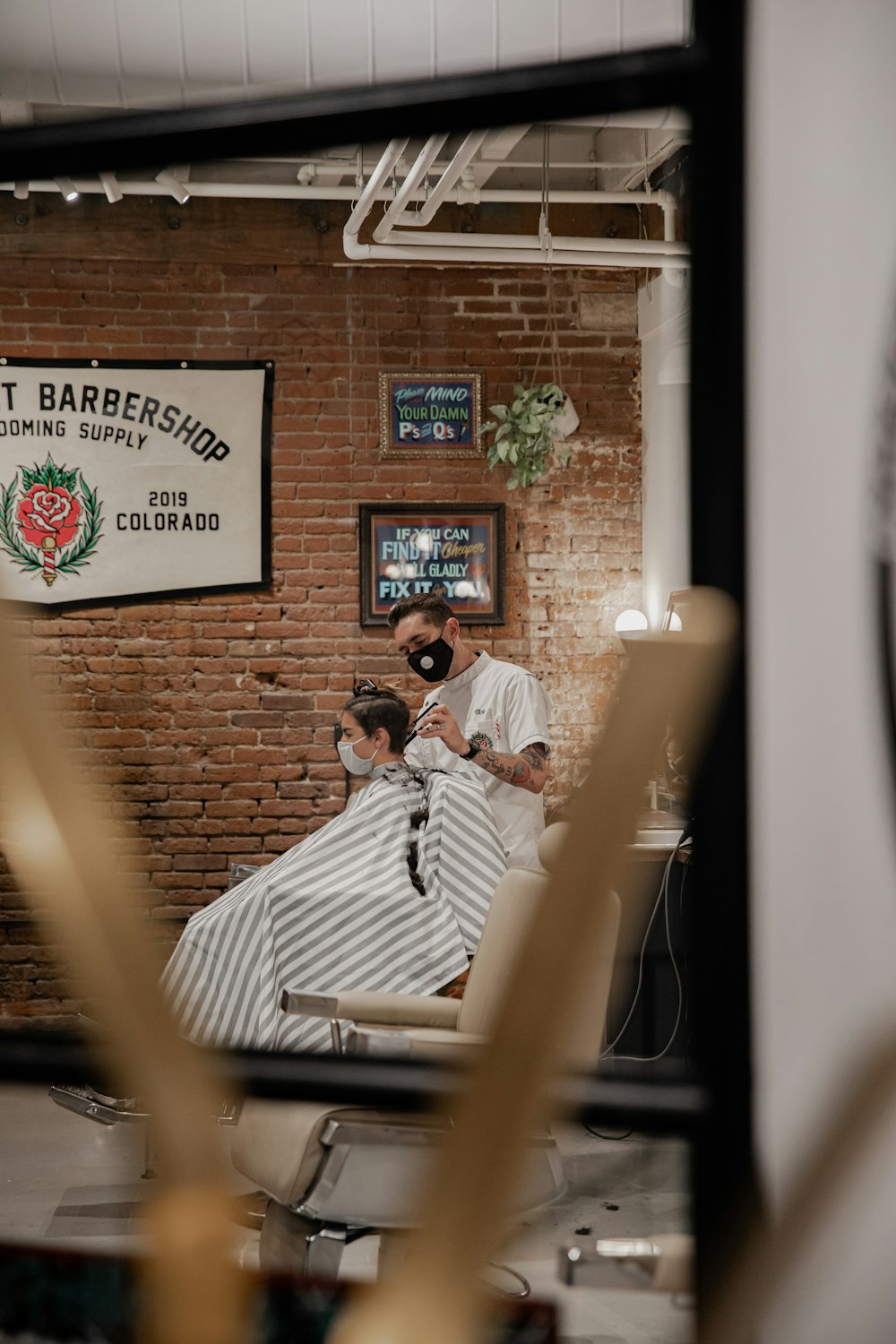 man in white shirt sitting on chair