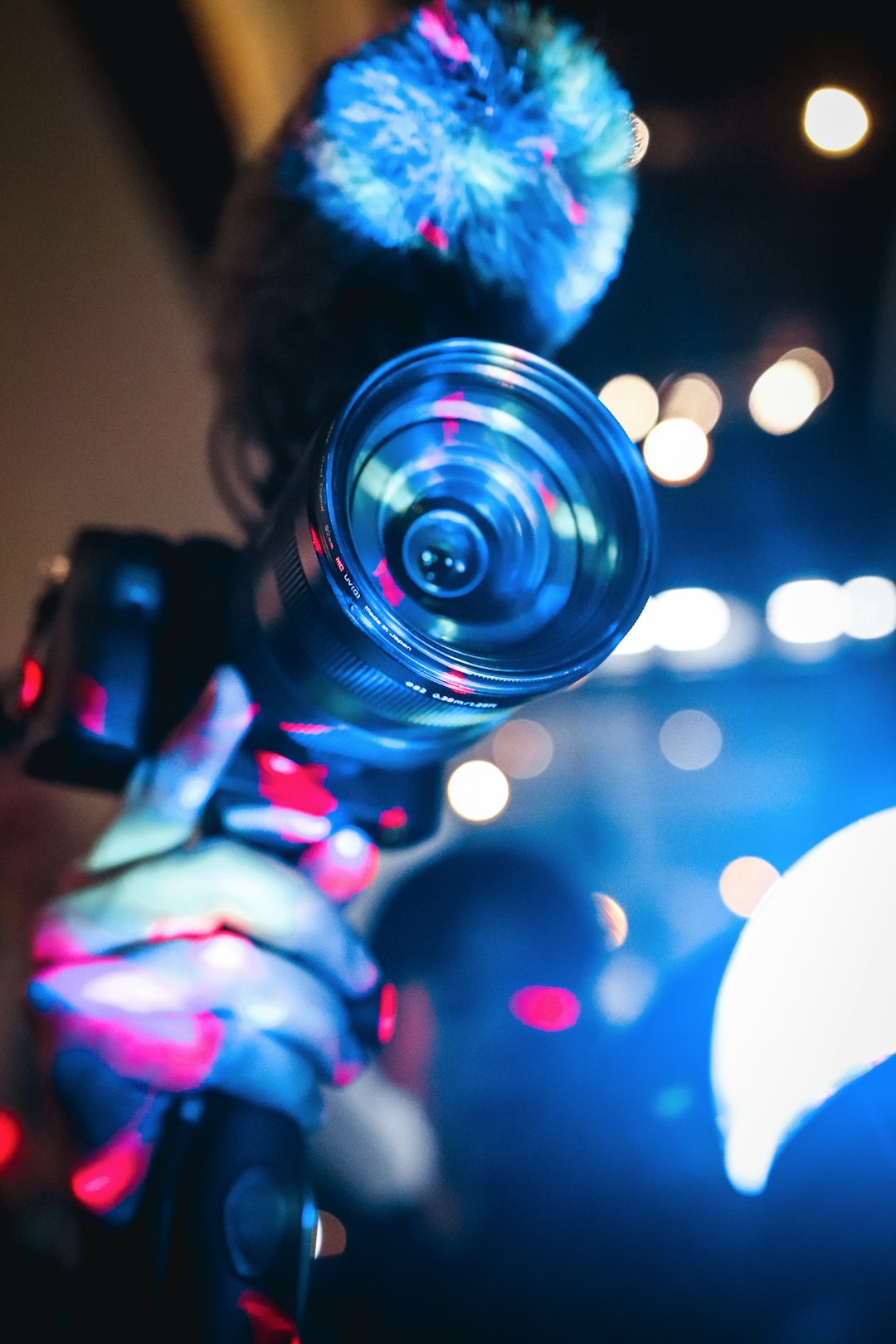 person holding black dslr camera