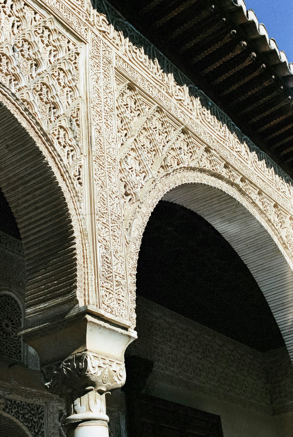 white and brown floral arch