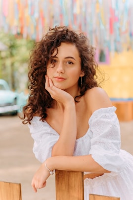 woman in white off shoulder dress