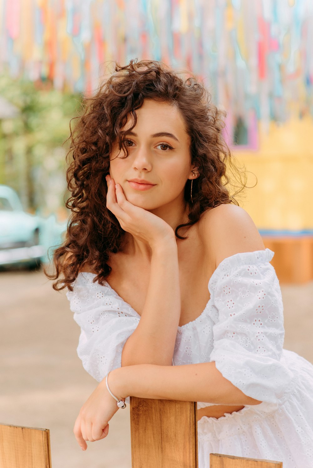 woman in white off shoulder dress