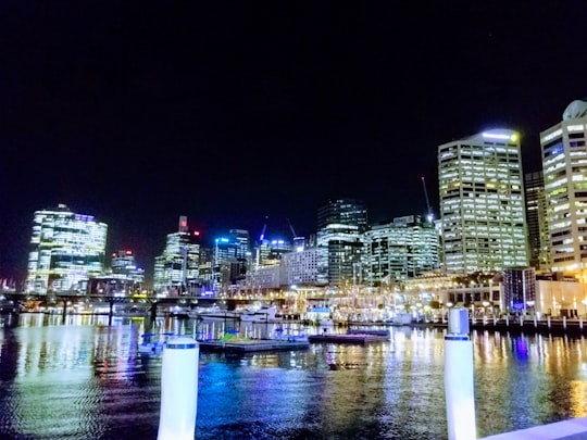 city skyline during night time in Darling Harbour Australia