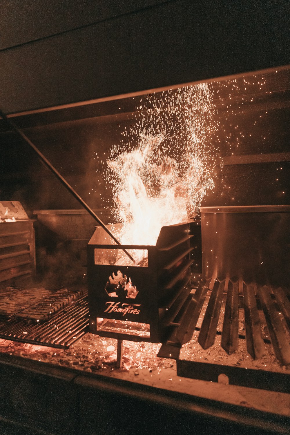 fire in black metal grill