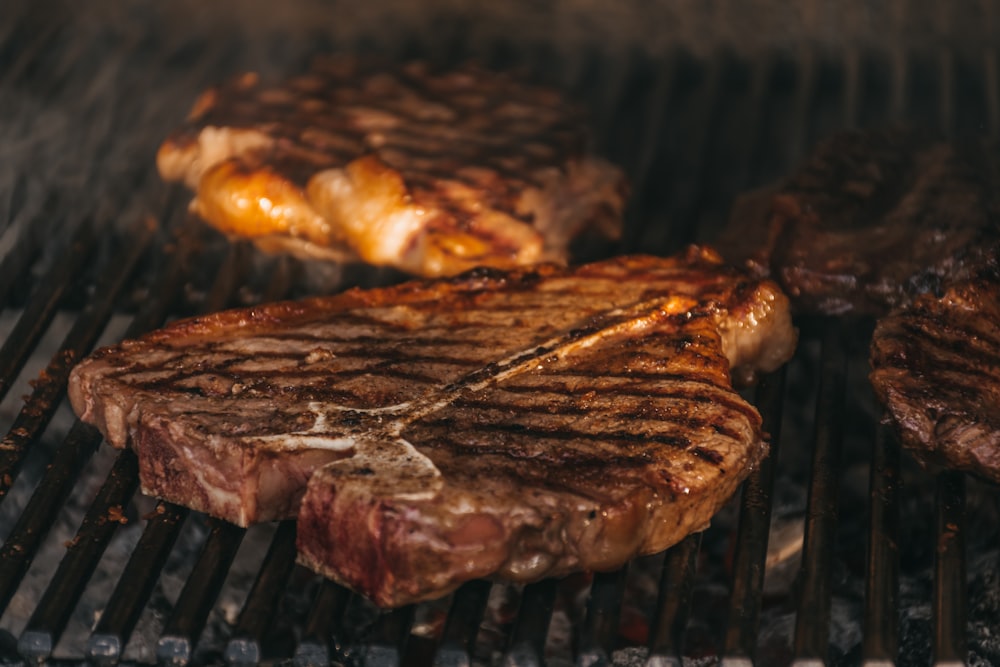 grilled meat on black charcoal grill