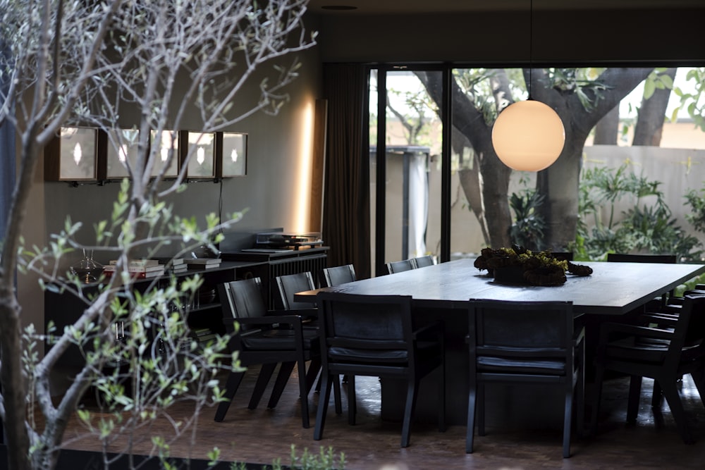 brown wooden table with chairs