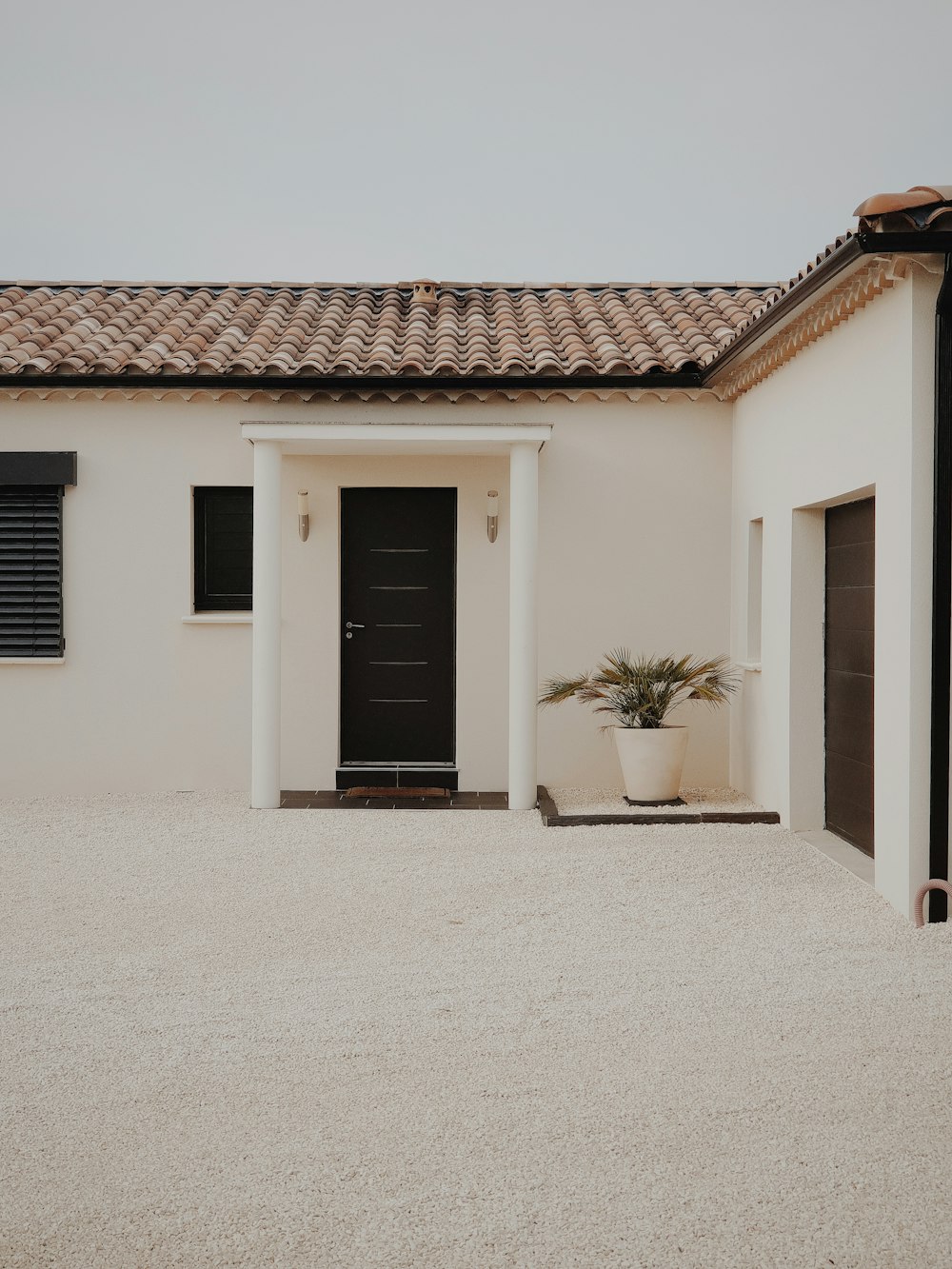 white and brown concrete house