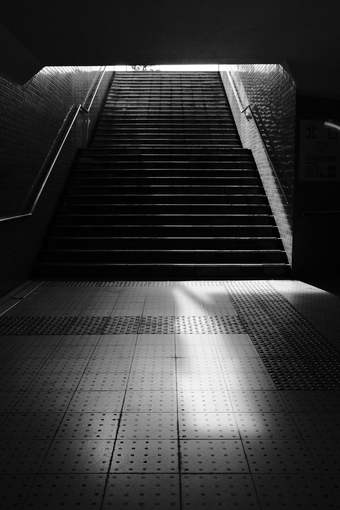 grayscale photo of empty staircase