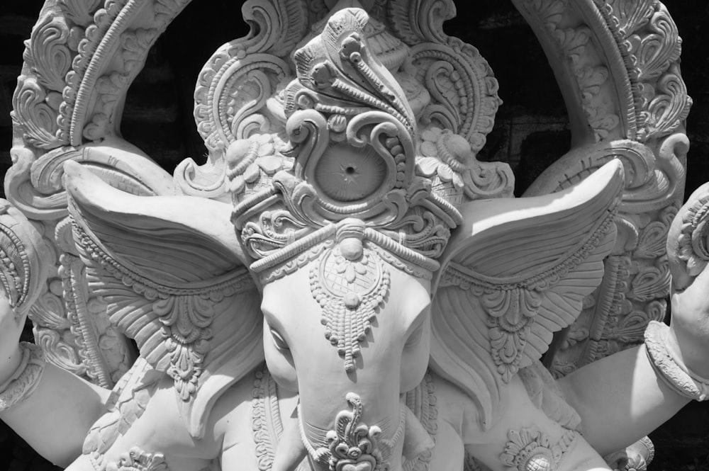 grayscale photo of angel statue