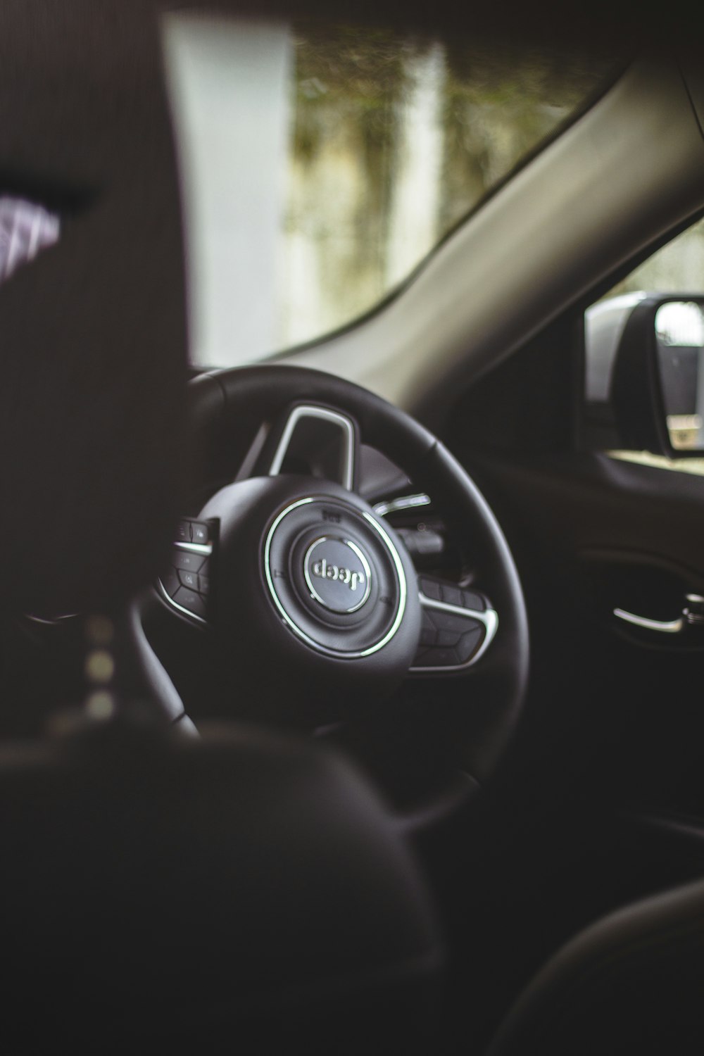 black and silver steering wheel