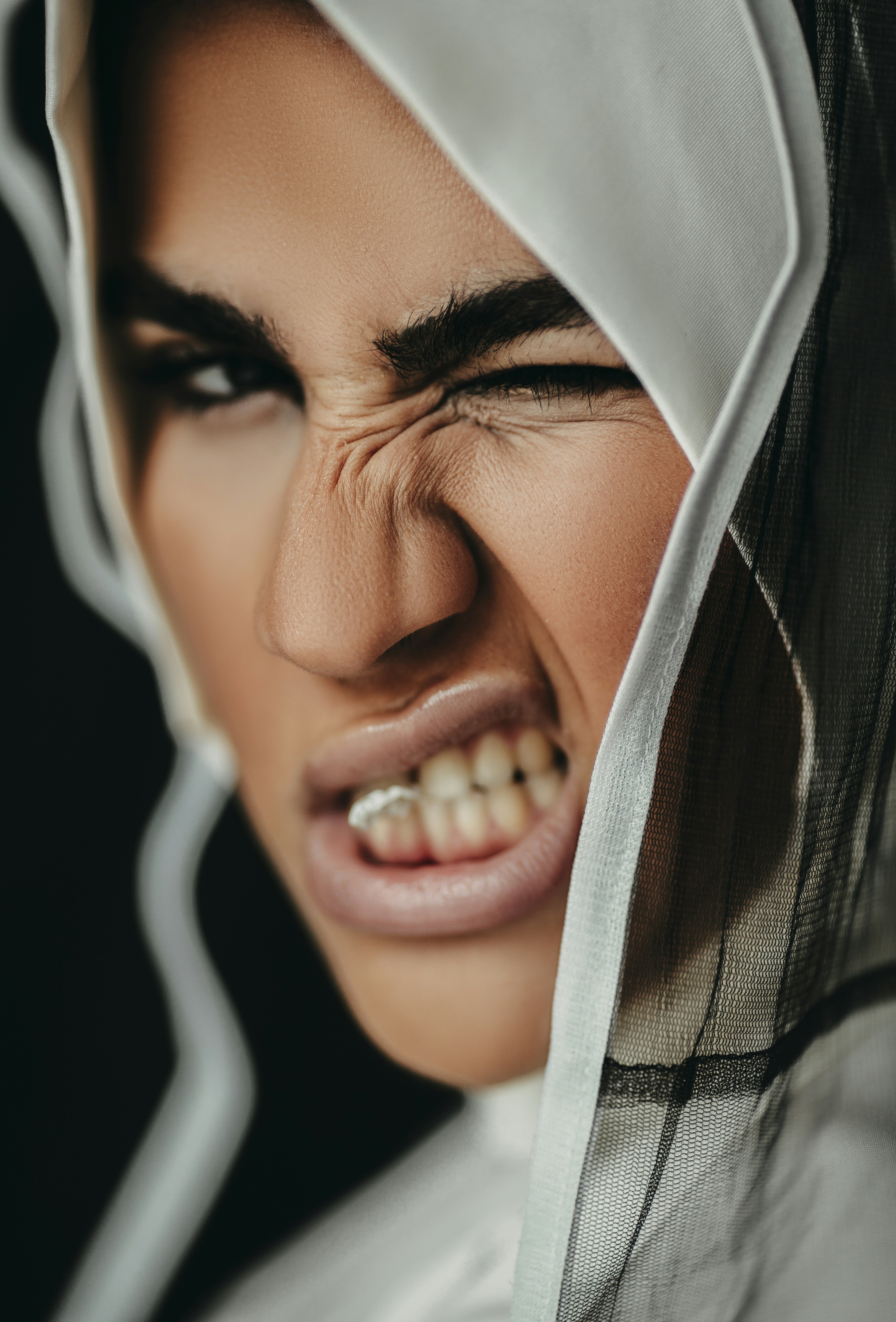 woman in white hijab smiling