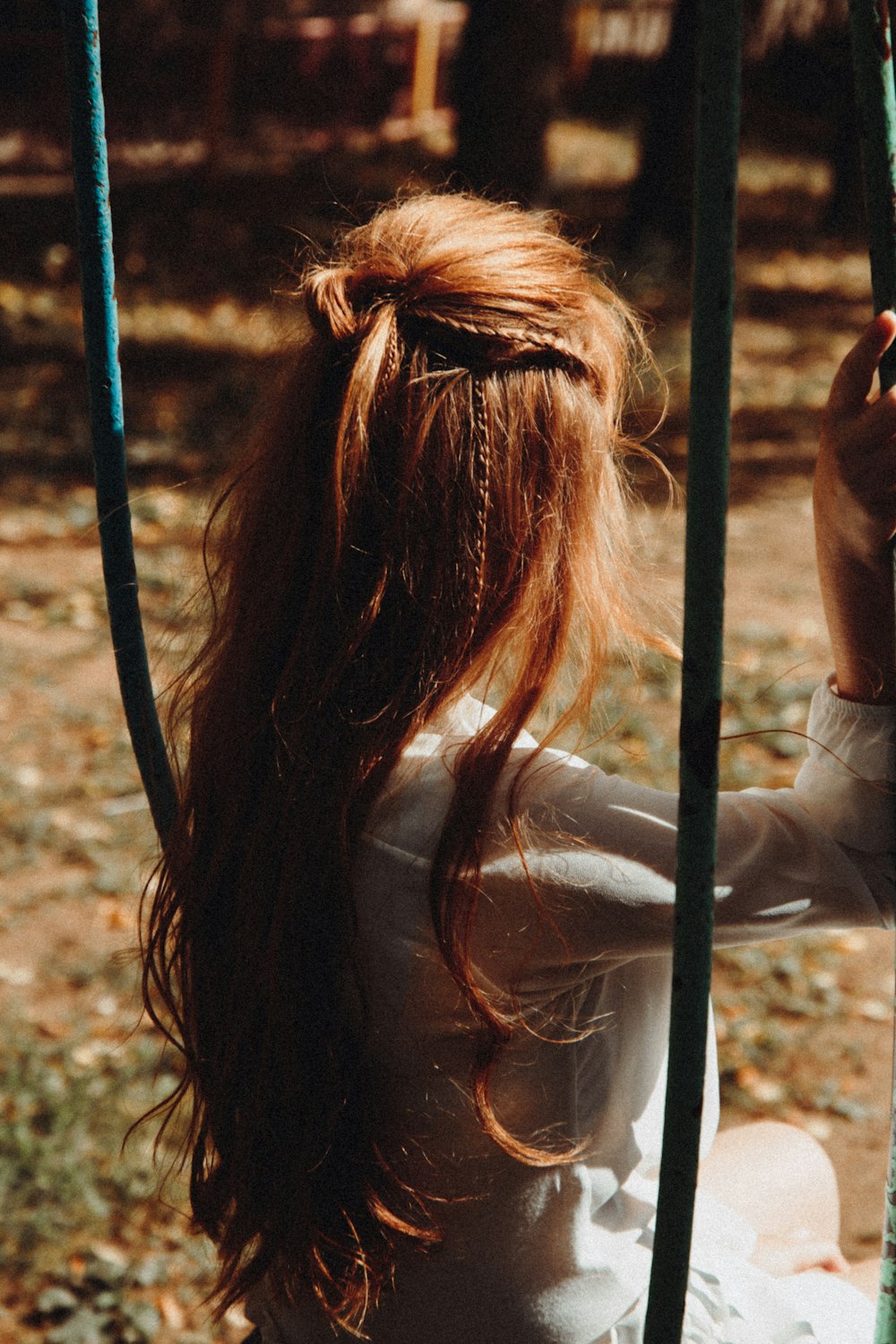 woman in white long sleeve shirt