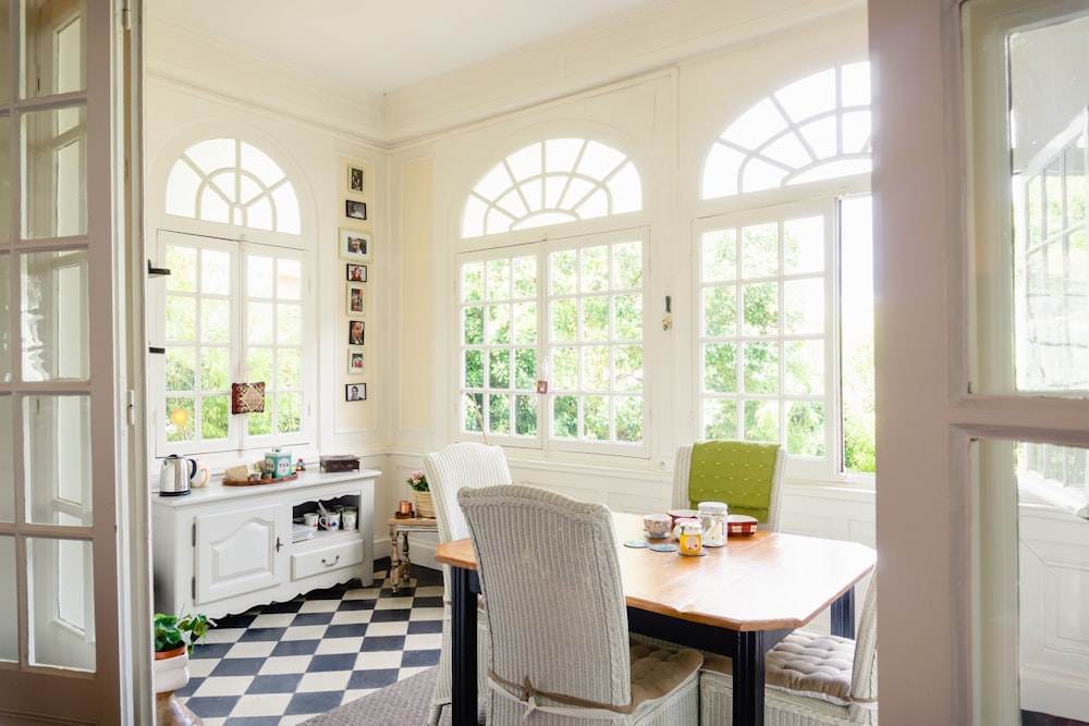 brown wooden table with chairs