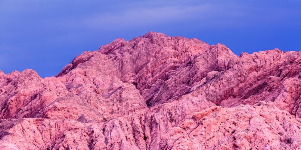 brown rocky mountain under blue sky during daytime