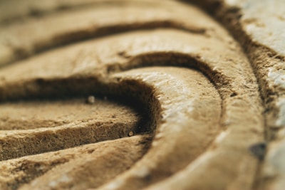 Detail of a textured 3D art piece with swirling patterns resembling a nebula.