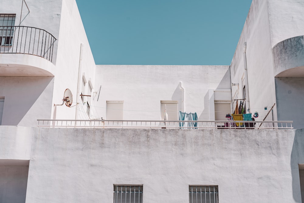 white concrete building under blue sky during daytime