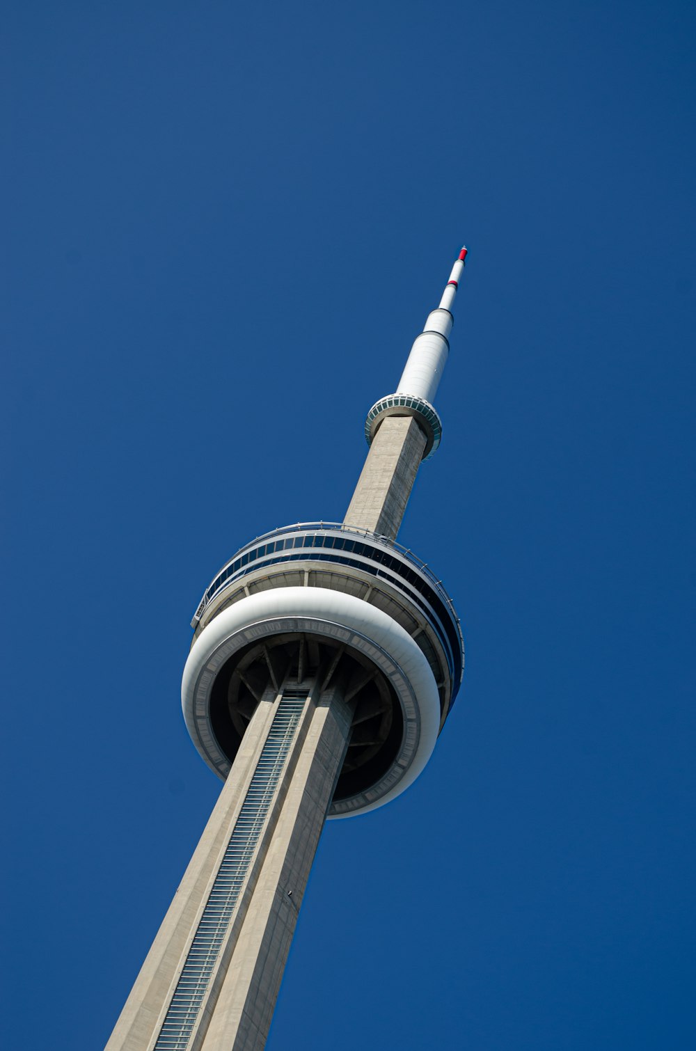 white and black tower under blue sky during daytime